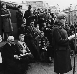 Person(s) in Photograph: Bertrand Russell, Edith Russell, Vanessa Redgrave Description: Bertrand Russell and Edith Russell watching the actress Vanessa Redgrave address the Committee of 100 meeting in Trafalgar Square, which preceded the anti-Polaris "sit-in" outside the Ministry of Defence on February 18, 1961. Archive Box Number: RA3 Rec. Acq. 1327 Date: 1961