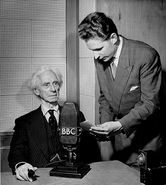 Person(s) in Photograph: Bertrand Russell, Veikko Konttinen Description: This is a photograph of Bertrand Russell being interviewed by Veikko Konttinen of the BBC Finnish Service for the series "Man of the Month". In the decade after World War II, Russell frequently broadcast on a variety of topics on both the Home and Foreign Services of the BBC. Archive Box Number: 4,5